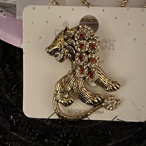 Source Unknown Gold Lion Brooch with Red and Silver Accents